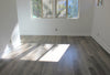 A room that has been re-done with Laminate Flooring, available at Standard Paint & Flooring.